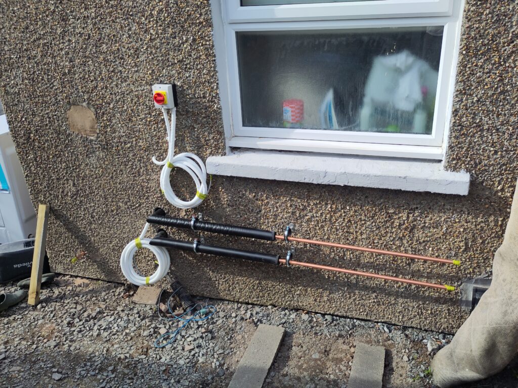 New outside pipes and cables mostly in place ready to be fitted the following day.
