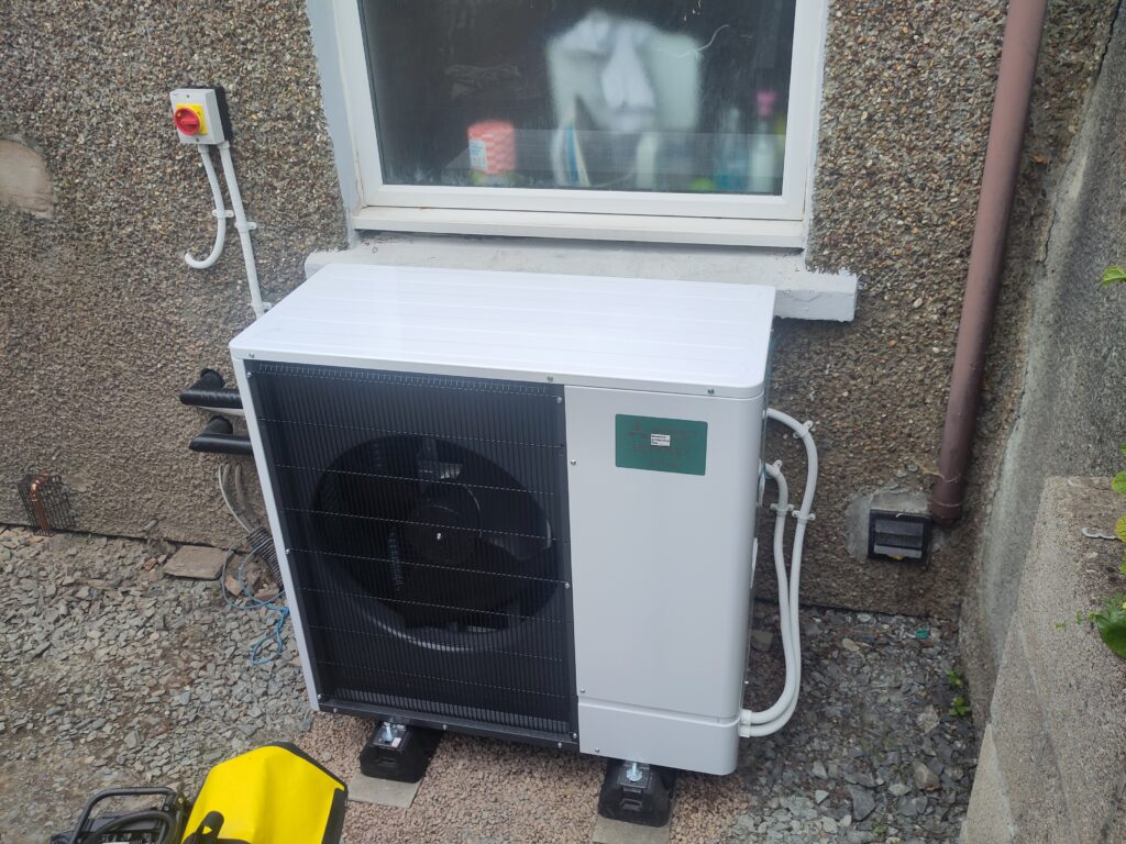 Heat pump in place front view.