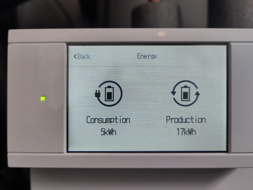 Heat pump controller showing Consumption 5kWh and Production 17 kWh.