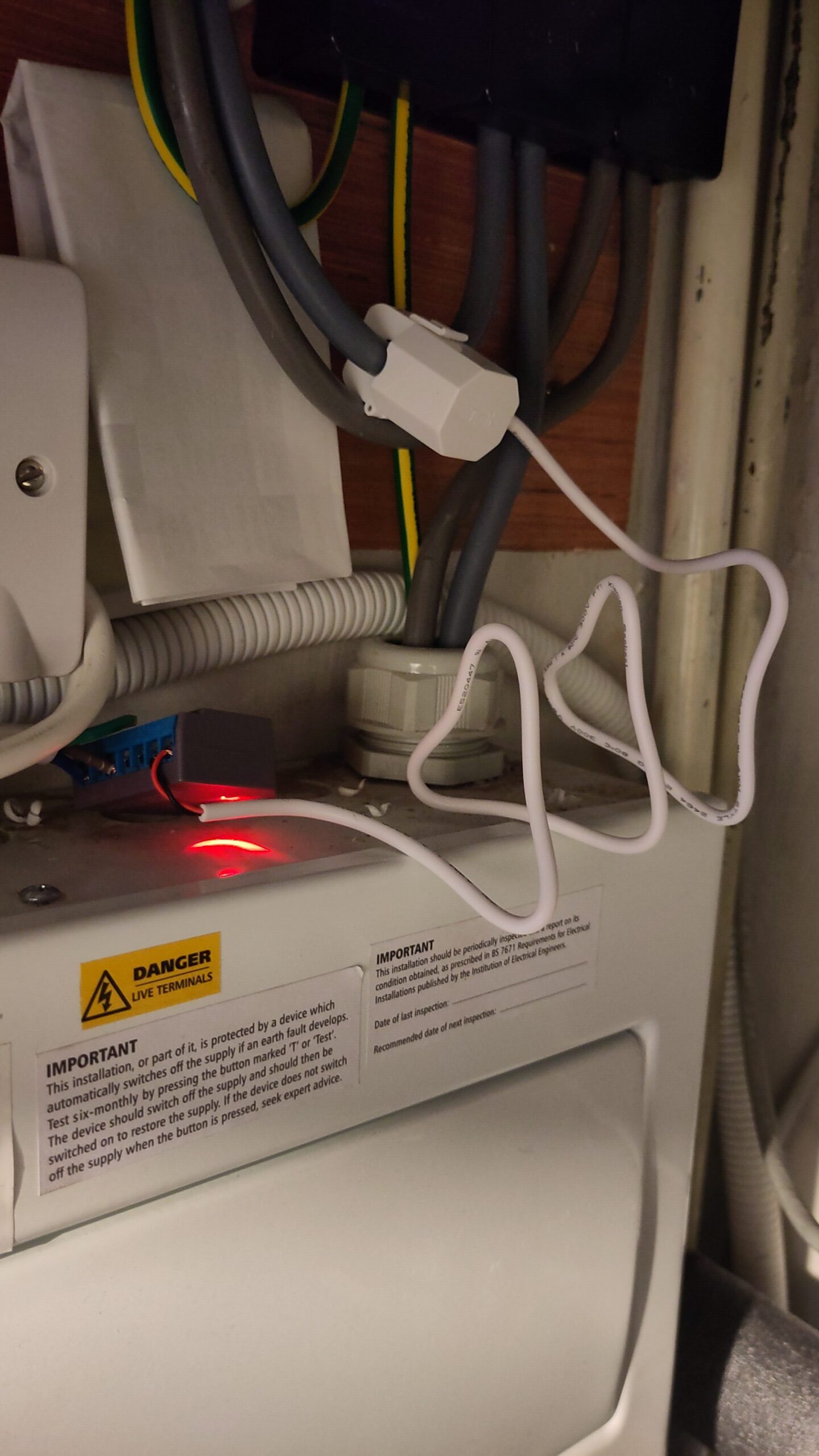 CT clamp around the electrical cable for all of the electric that the heat pump uses. This links to the grey meter box.